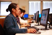 female computer student using a computer