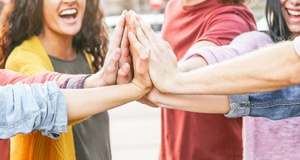 group of people holding hands